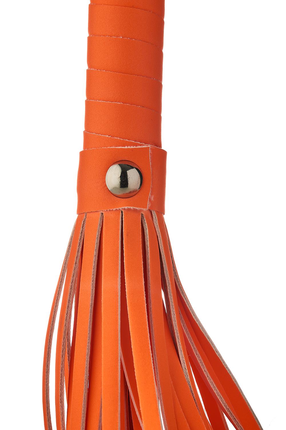 Selvlysende Orange Bondage og BDSM pisk i selvlysende design fra Radiant